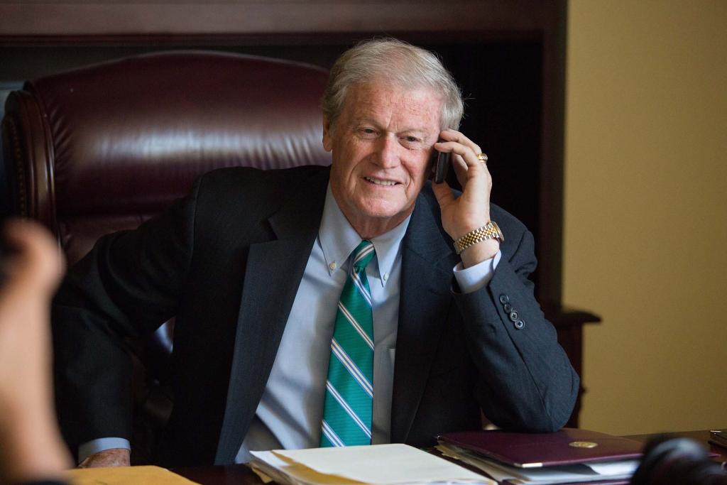 John Thrasher, the 15th president of Florida State University, makes a phone call during his first day in office at the Westcott Building on Nov. 10, 2014.