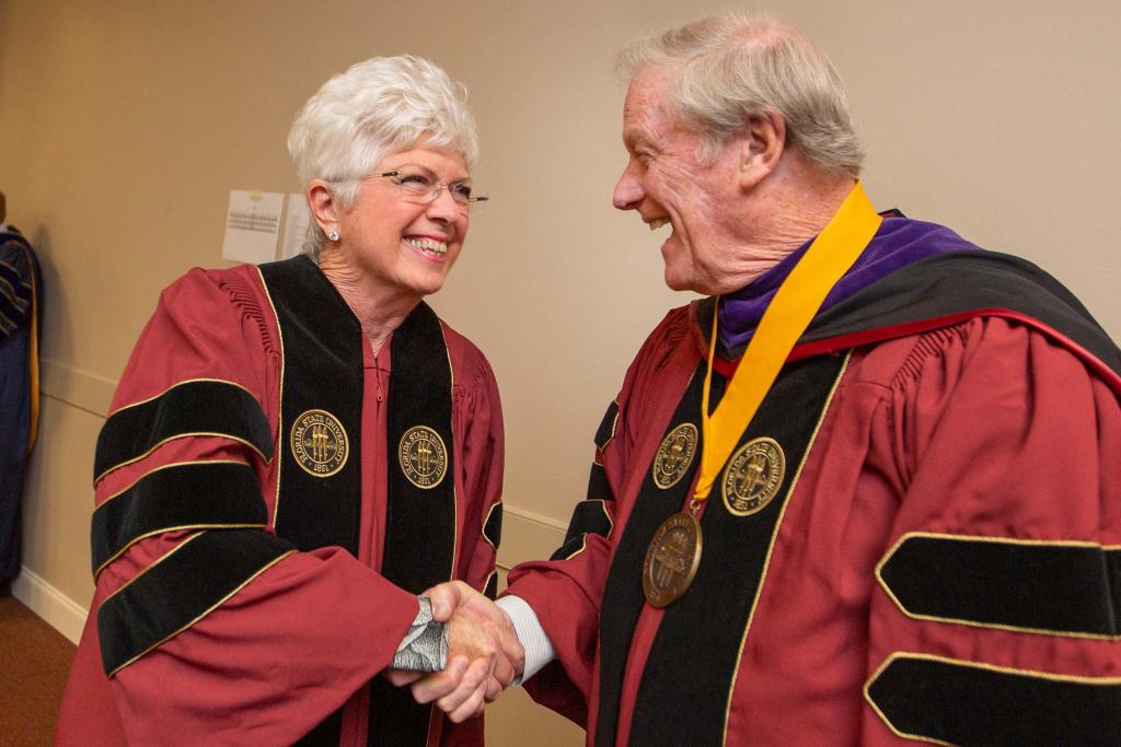 Jan Moran and President Thrasher get ready for Spring Commencement on May 2, 2019. Mrs. Moran greeted the first graduate of the Jim Moran College of Entrepreneurship on stage during the commencement ceremony.