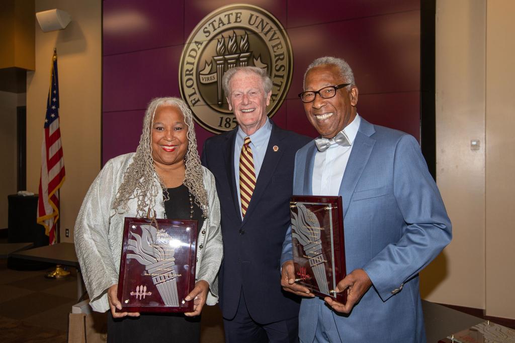 President Thrasher with Torch Awards recipients Doby and Fred Flowers in May 2021.