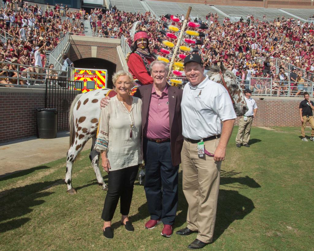 John and Jean Thrasher with Osceola and Renegade and Allen Durham at a football game in September 2018.