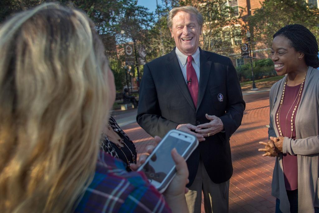 President Thrasher speaks with students in October 2015.